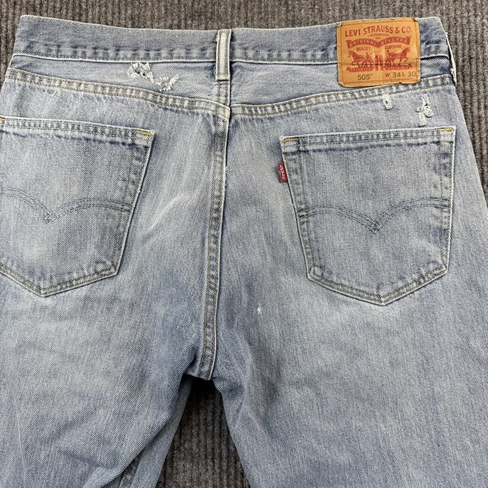 Levis 505 Jeans Mens 34x29 Light Wash Blue‎ Straight Leg Denim Distressed Casual